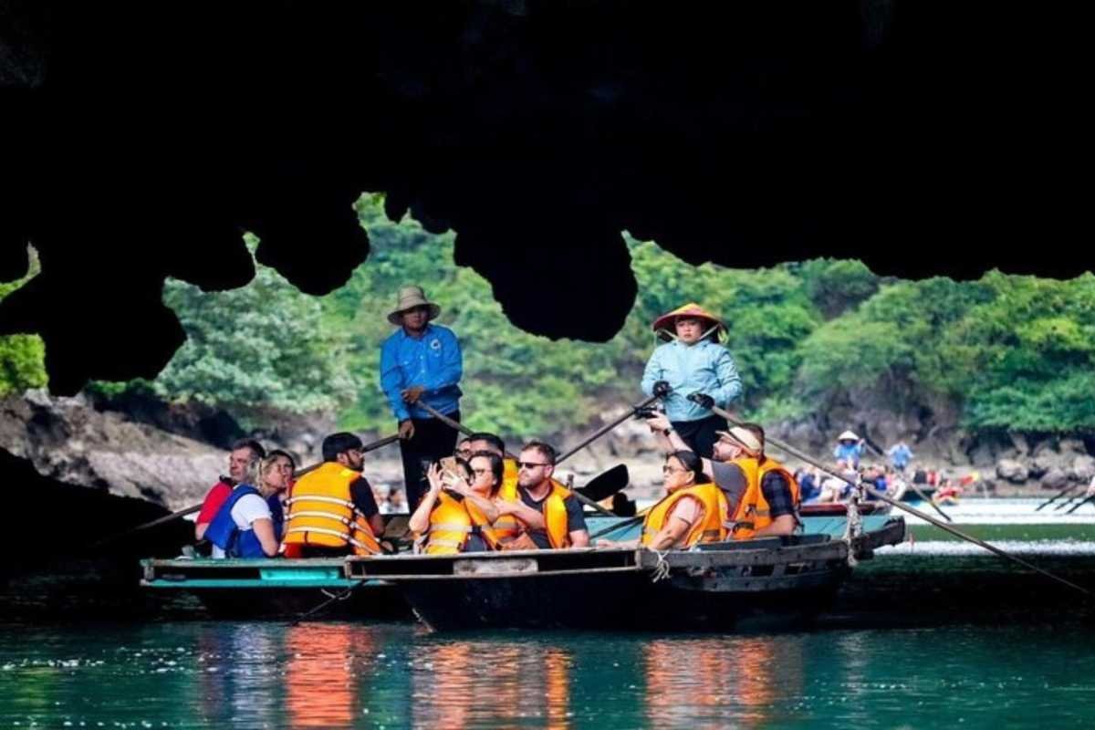 Bamboo boat ride into Luon Cave